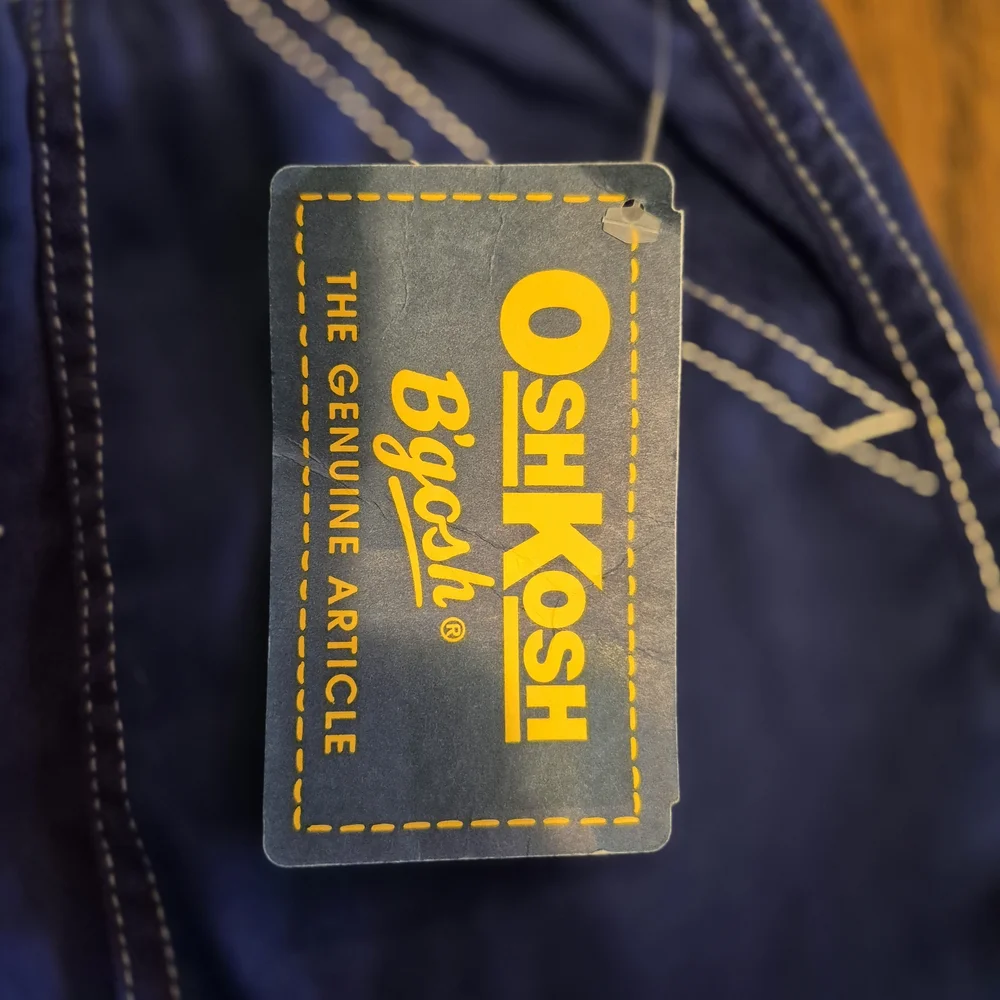 OshKosh B'gosh blue swim trunks size 5 with white stitching